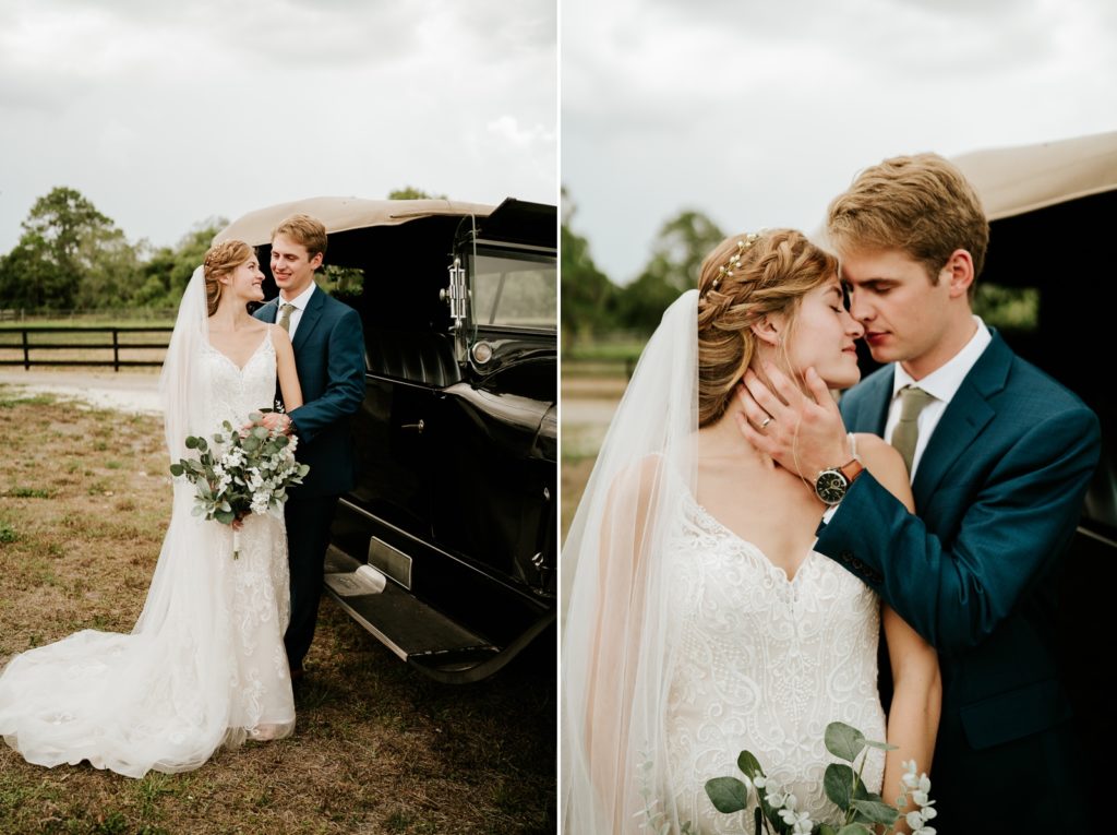Groom caresses bride next to classic car at Ever After Farms Ranch wedding