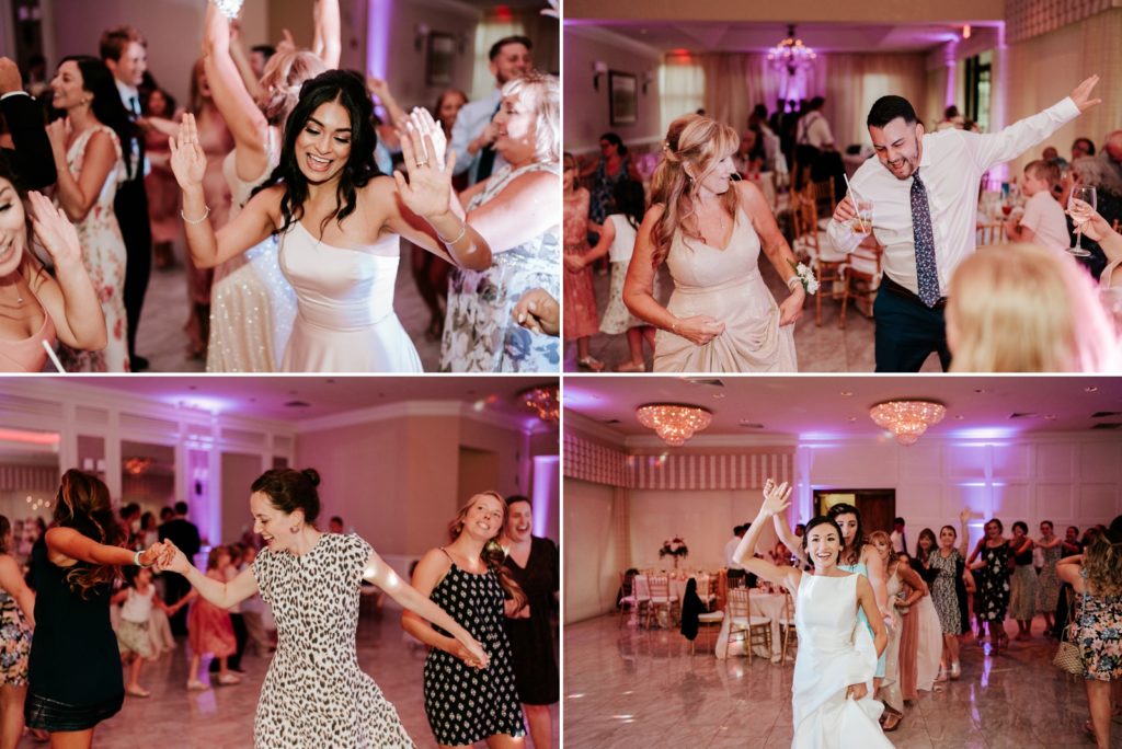 Guests dancing and bride leading conga line in Breakers West wedding reception Palm Beach FL