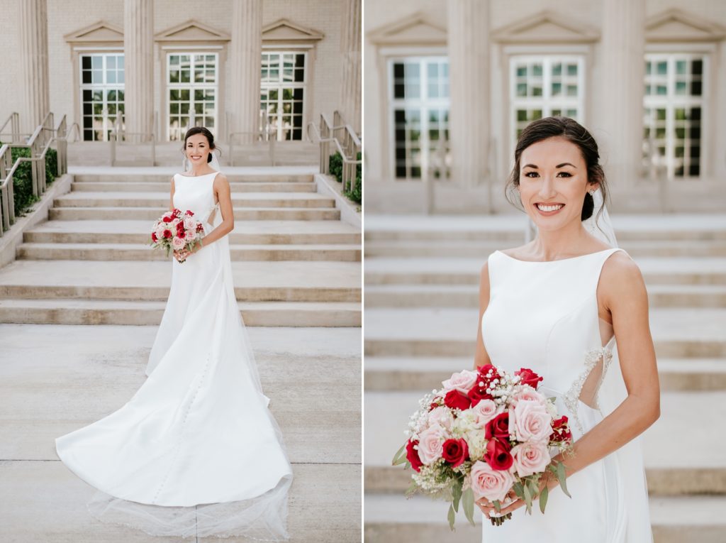 Bride in white satin wedding gown holds bouquet of pink and red roses outside Family Church Downtown