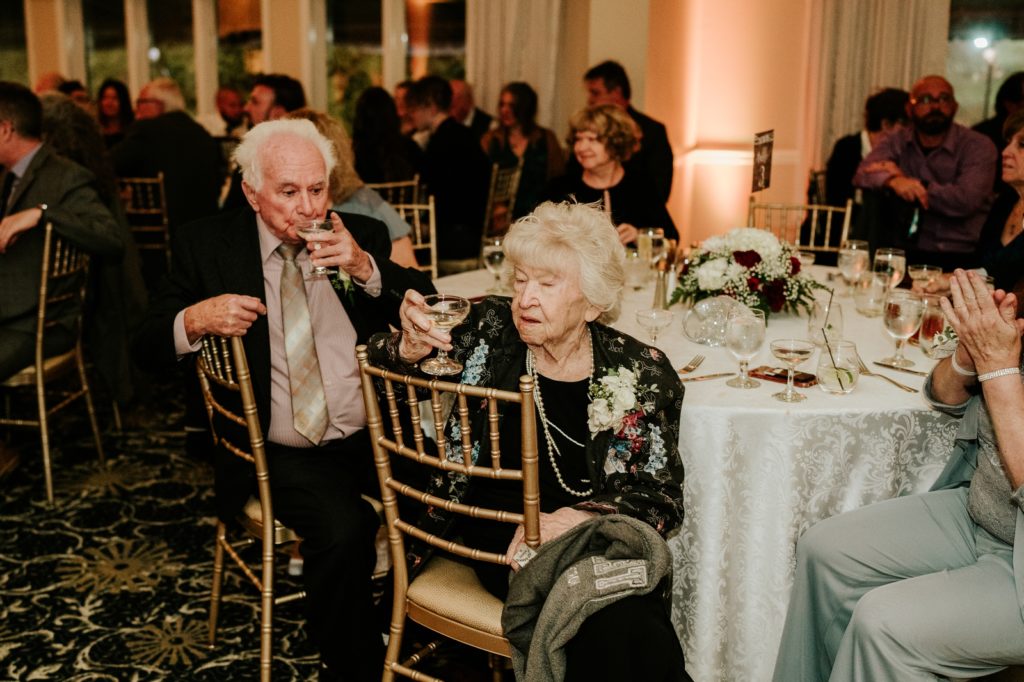 Grandparents watch first dance at Bensalem Township Country Club wedding reception