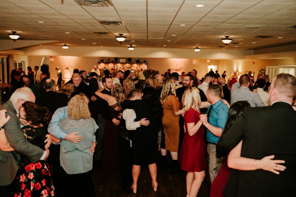 Room of guests slow dance at Bensalem Township Country Club wedding reception
