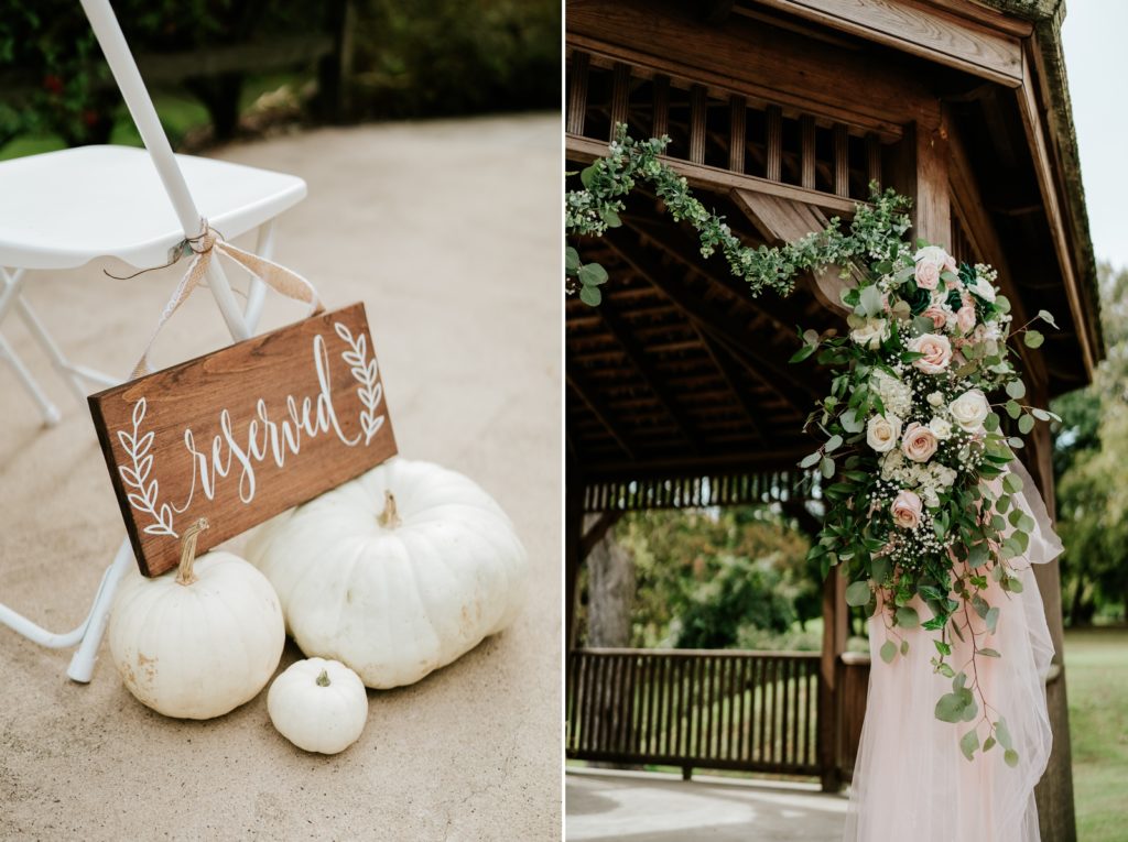 Reserved seating with white pumpkins and florals decorating gazebo ceremony site