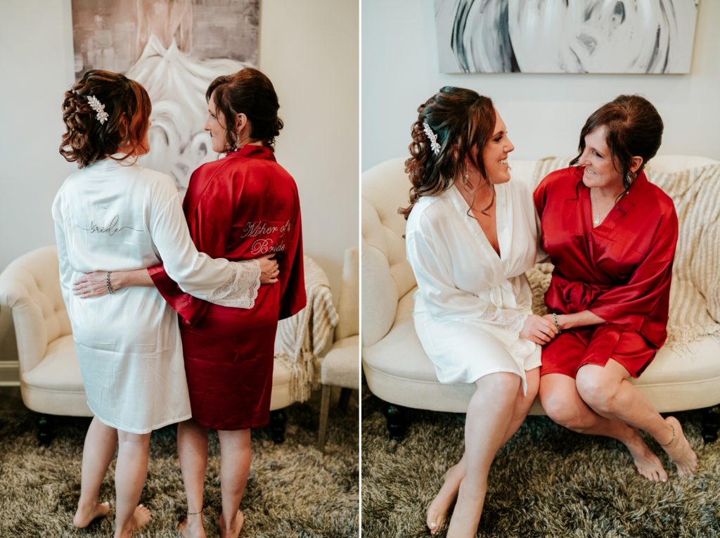 Bride and her mom wearing custom wedding robes in getting ready suite