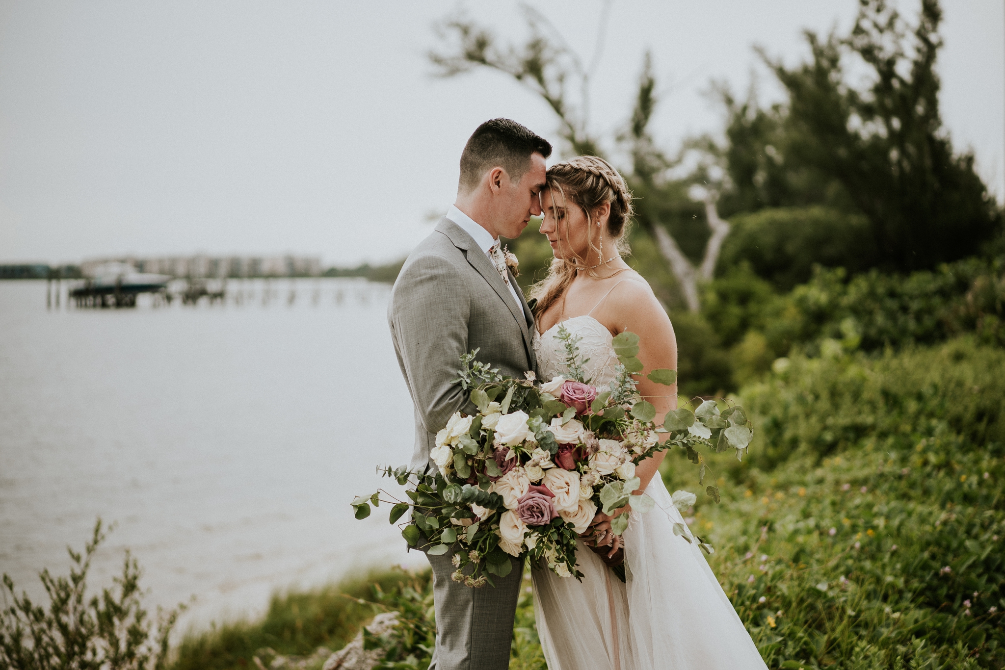 Hutchinson Island wedding couple touch foreheads during House of Refuge elopement