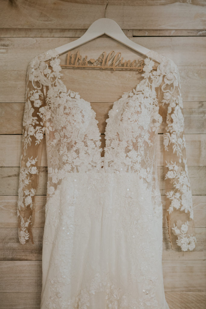 Floral lace appliqué beaded wedding dress for Florida bride by Martina Liana at Ever After Farms Ranch Barn FL