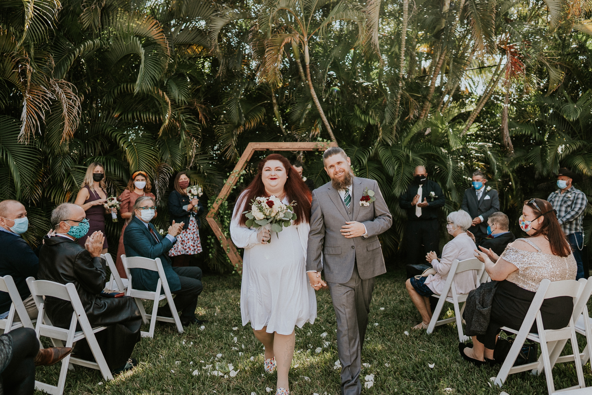 West Palm Beach FL backyard wedding ceremony with palm trees