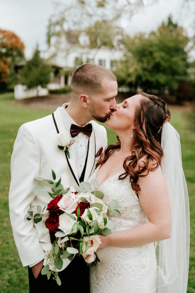 Fall wedding portrait with rose bouquet by Infinitely Yours Flowers