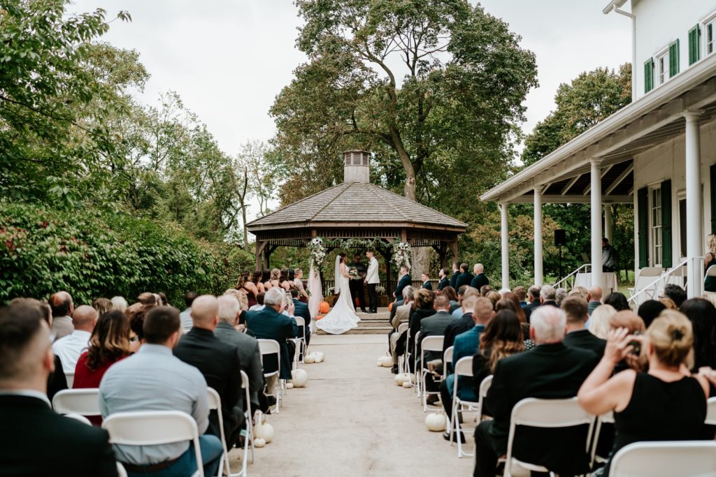 Bensalen Township Country Club fall wedding ceremony under gazebo