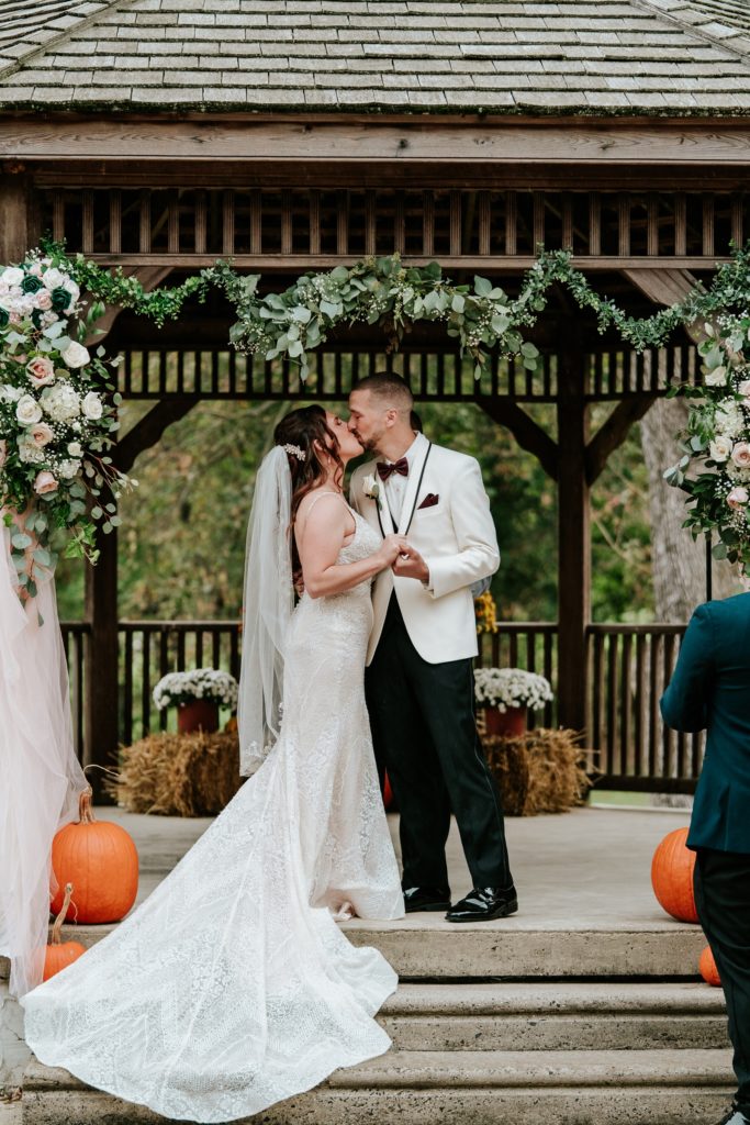 Bensalemn Township Country Club fall wedding ceremony first kiss