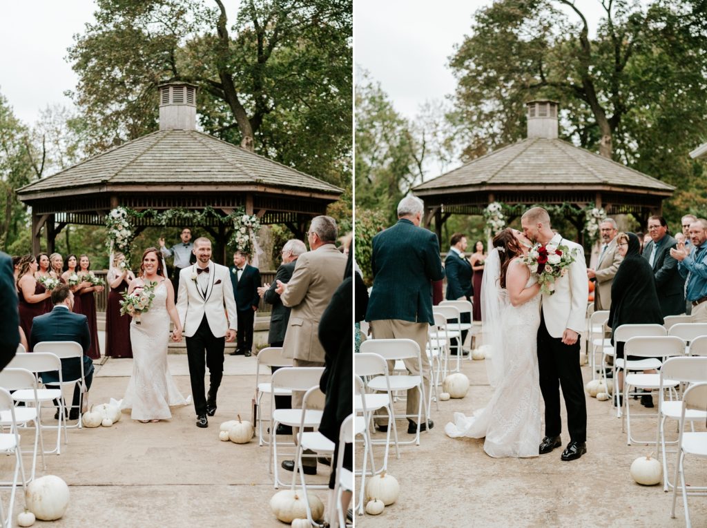 Bride and groom walk down the aisle and kiss in front of Bensalen Township Country Club gazebo