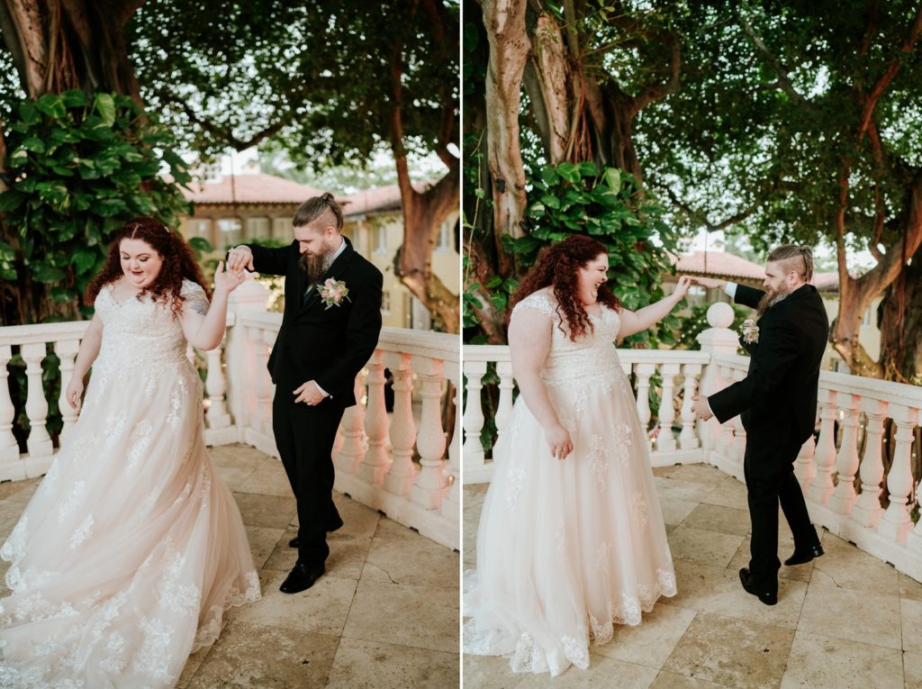 Groom twirls bride on balcony at the Addison of Boca Raton during wedding first look